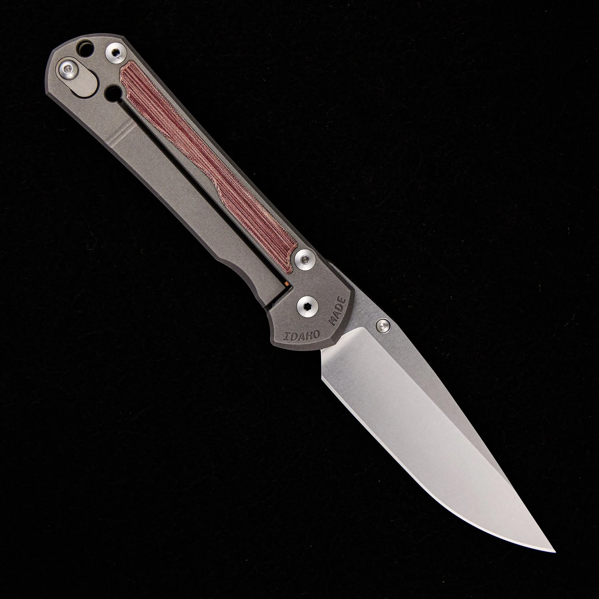 LARGE SEBENZA 31 RED LINEN MICARTA INLAY – DROP POINT BLADE – SILVER SINGLE THUMB LUG - Image 2