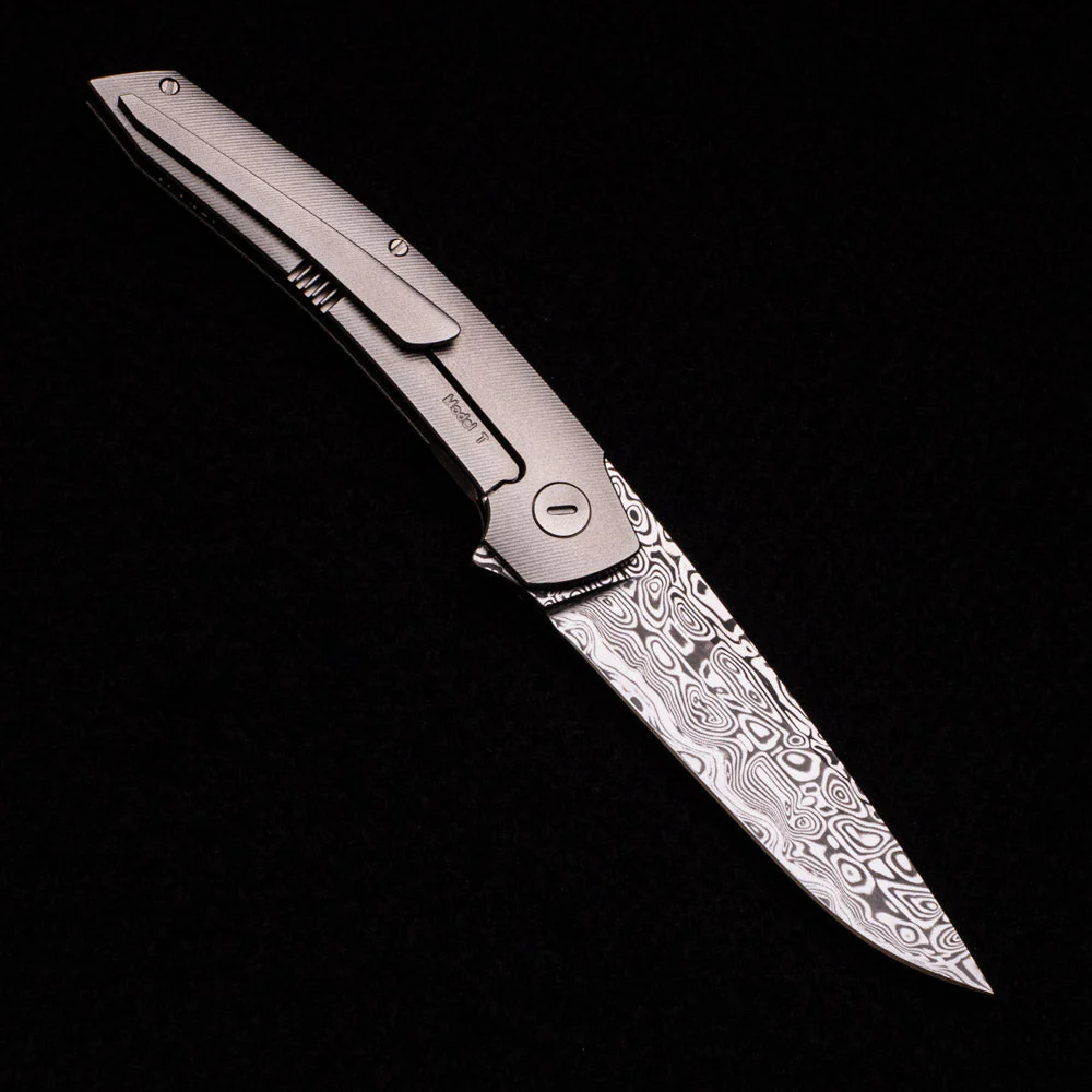 Model T ā Damasteel Blade ā TI W- Silver ā Black Micarta Inlay - Image 2