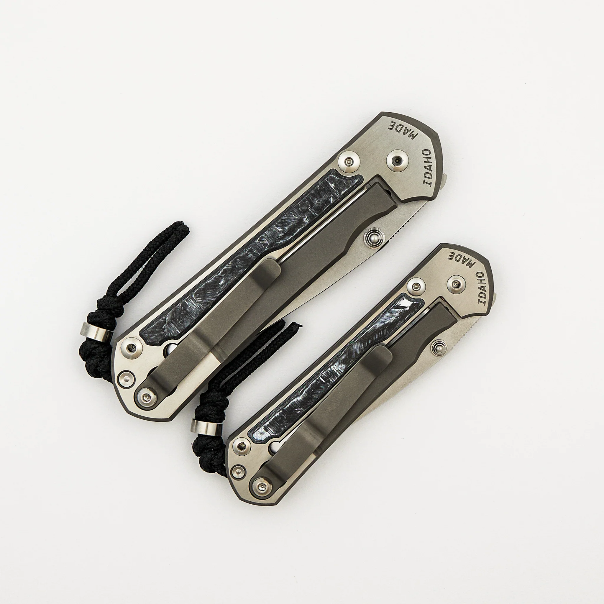 Large & Small Sebenza 31 Numbered Matched Set - White CarboTi Inlay - Polished Drop Point CPM MagnaCut Blade - Silver Double Lugs - Image 4