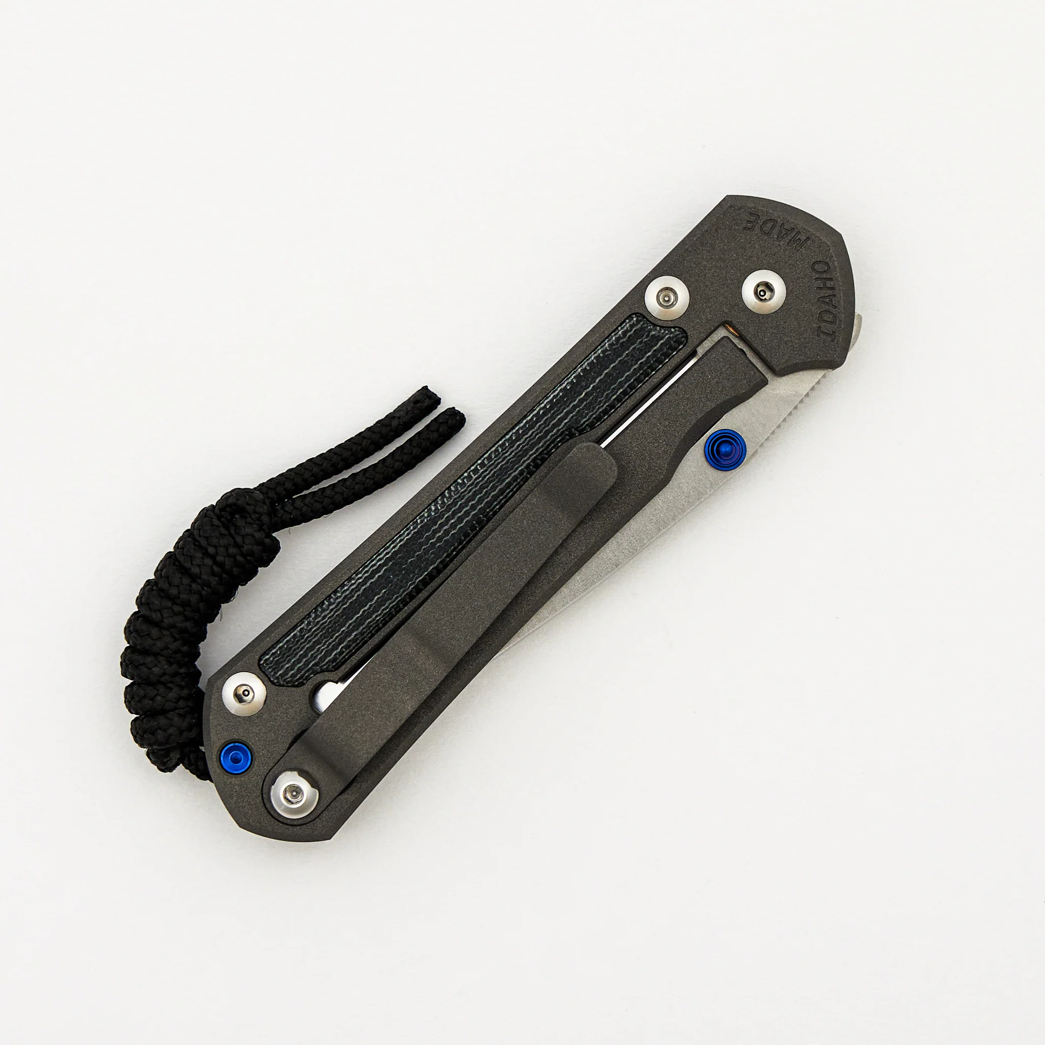 Small Sebenza 31 - Black Canvas Micarta Inlay - Polished CPM MagnaCut Blade – Blue Double Thumb Lugs - Image 4