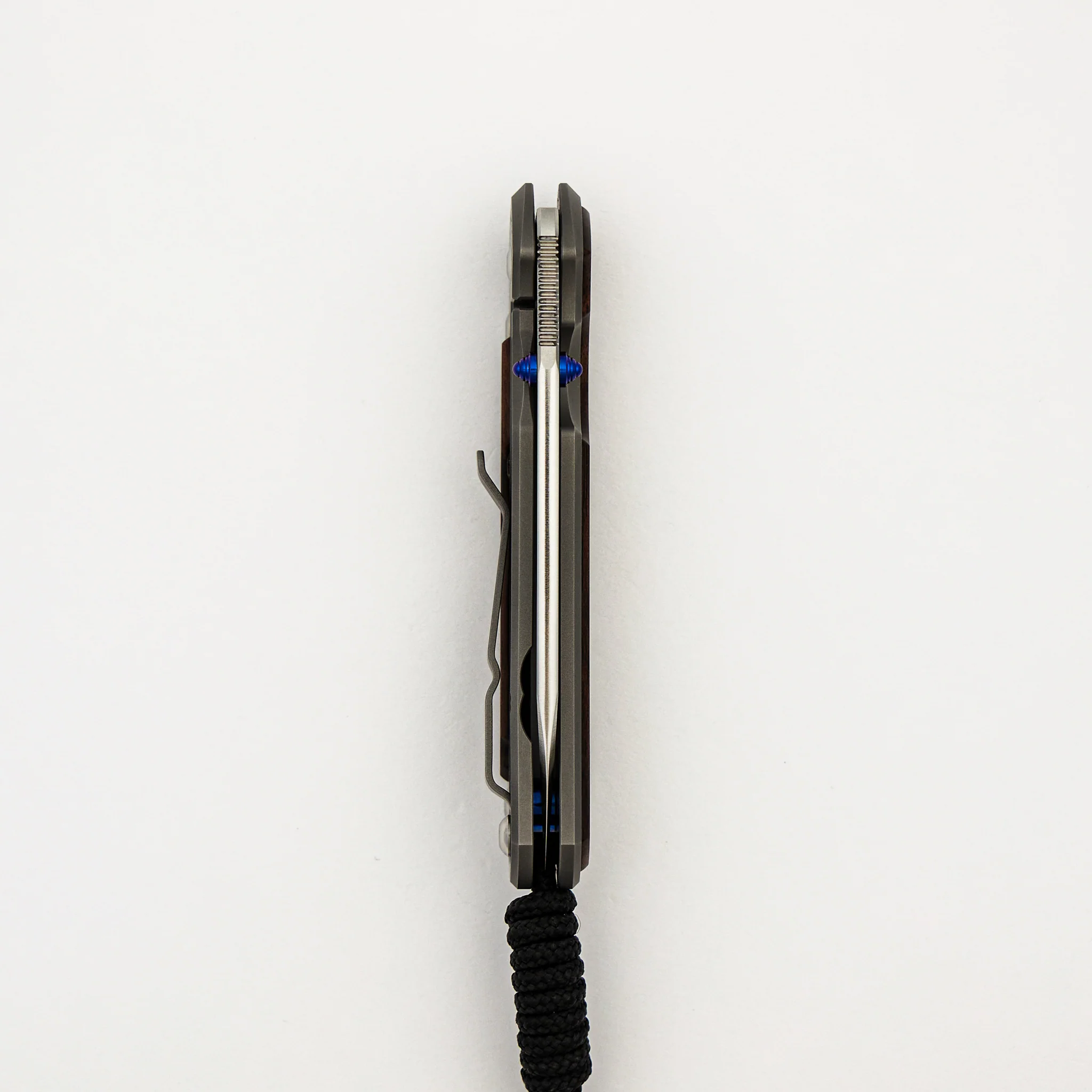 Small Sebenza 31 - Macassar Ebony Inlay - Insingo CPM MagnaCut Blade - Blue Double Thumb Lugs - Image 26